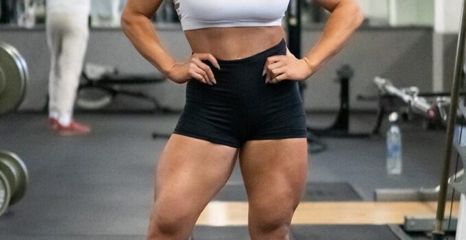 Carly Thornton posing in the gym looking fit and strong