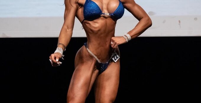 Beatriz Biscaia posing on the bikini stage looking fit and lean