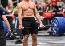 Alex Anderson lifting heavy barbell deadlifts during a CrossFit event