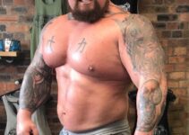 Eddie Hall posing shirtless for the photo looking strong and big