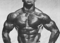 Harold Poole performing a bodybuilding pose looking big and ripped