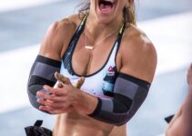 Kara Webb Saunders clapping and smiling during a CrossFit contest