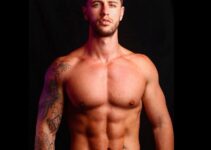 Vince Azzopardi posing shirtless in a photo