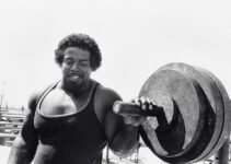 Bill Pettis in his prime, holding onto a barbell for the 1984 Olympics poster.