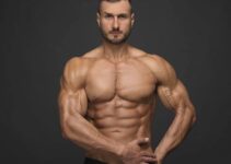 Emil Goliath posing directly in front of the camera, looking lean and aesthetic