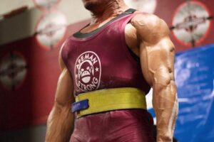 Larry Wheels lifting extremely heavy deadlifts during a powerlifting competition